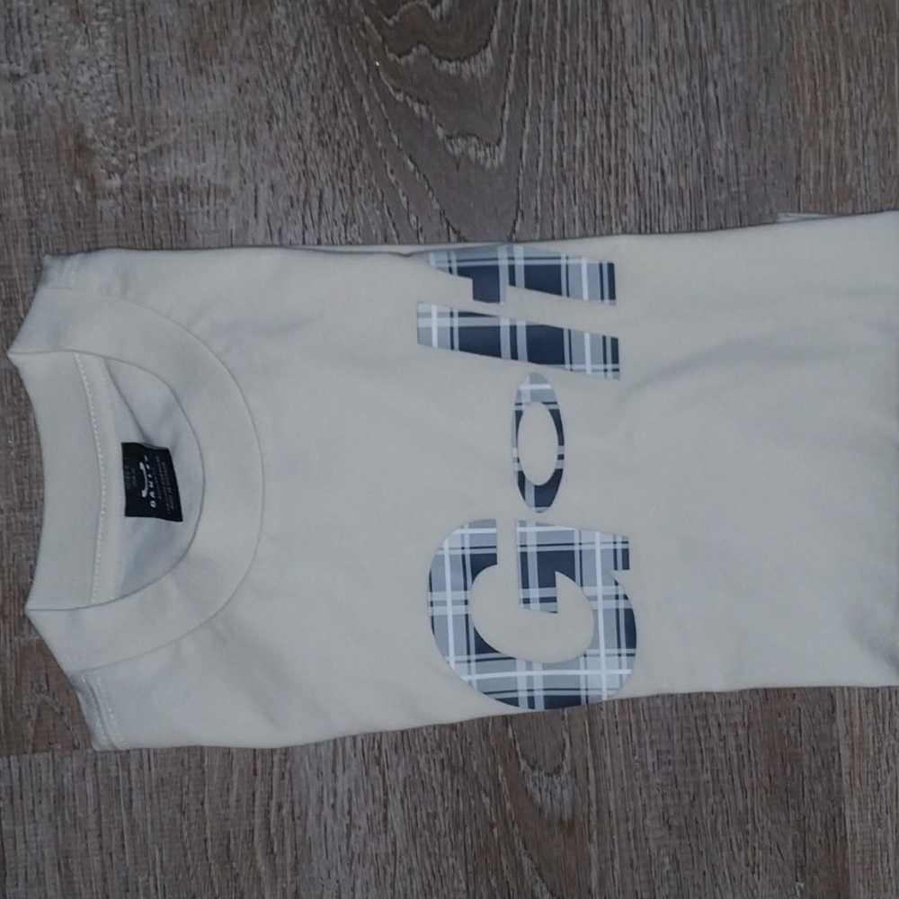 Nwt Oakley gold tshirt size medium